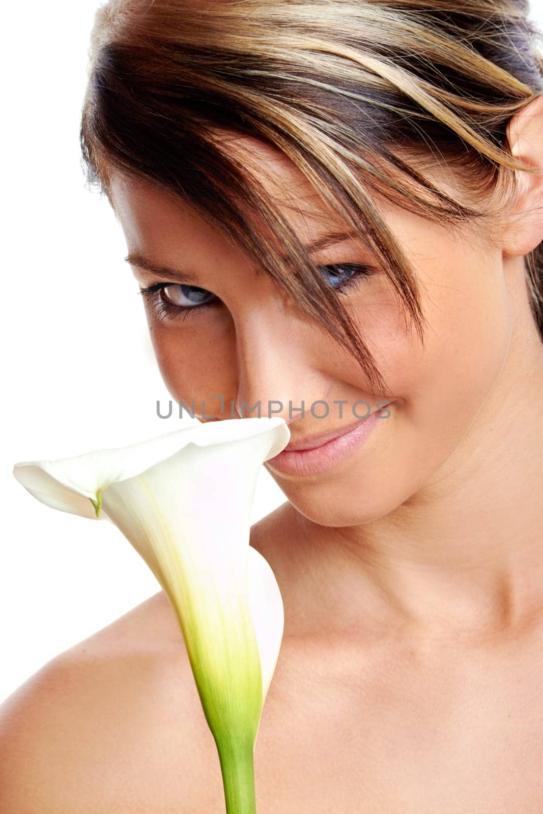 Beautiful young girl with flower against white background