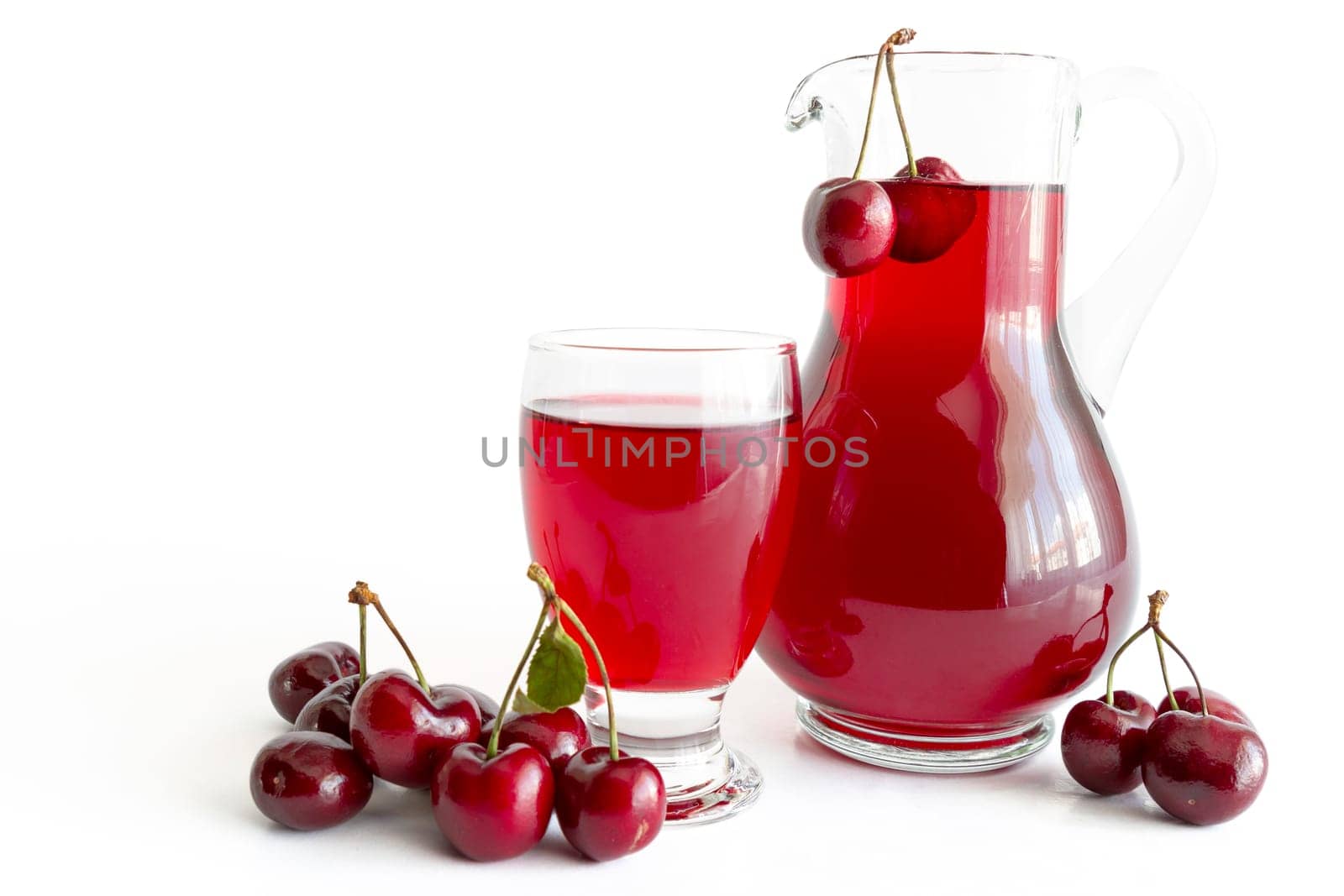 Fresh cold drink with cherry against white background