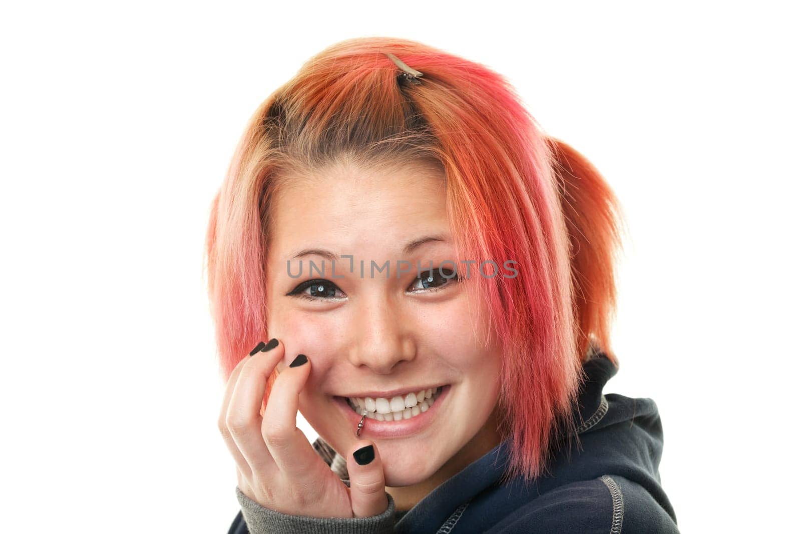 Portrait of teenager with piercing,studio shot against white background