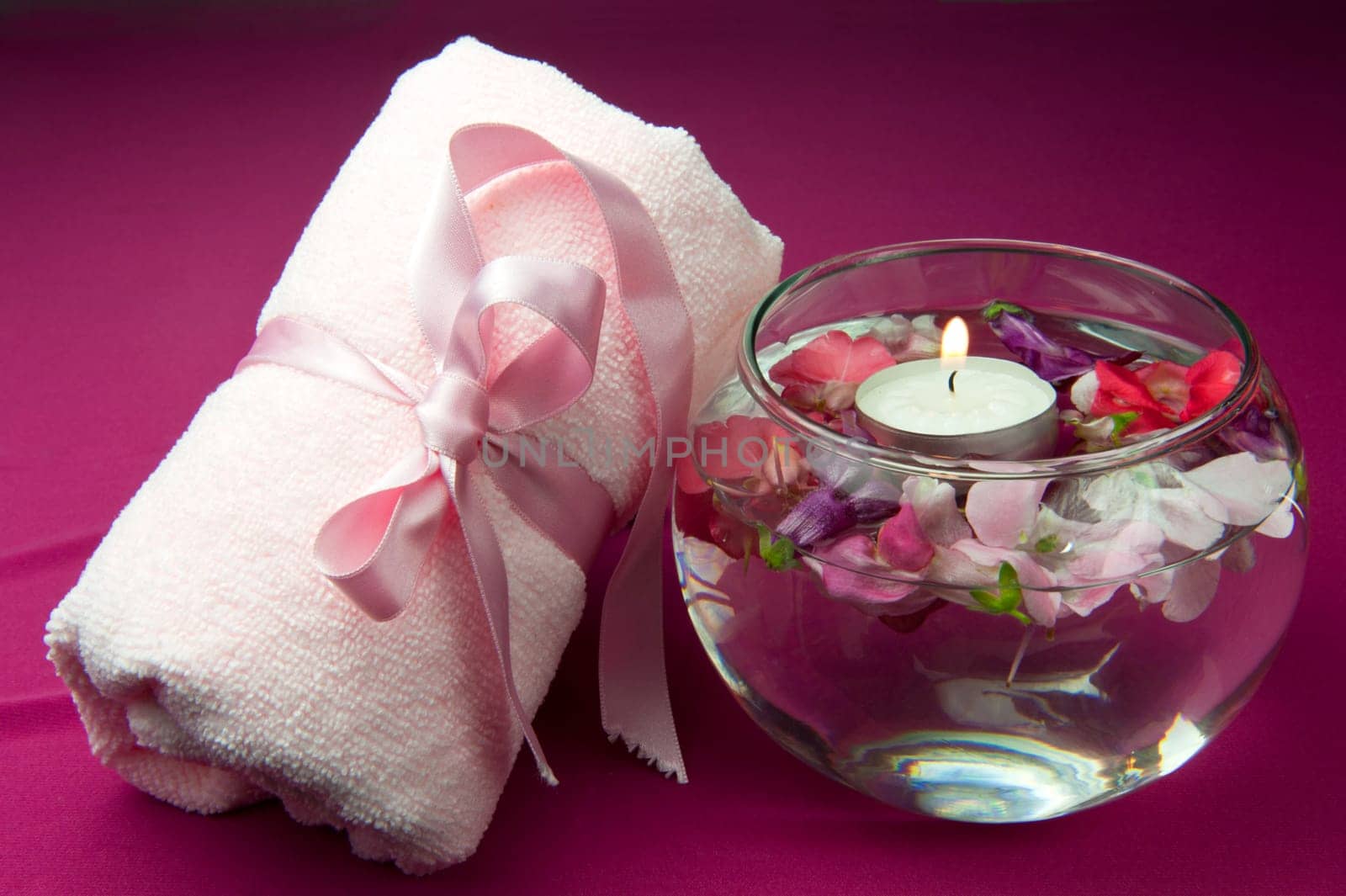 scented products for body care on colored background