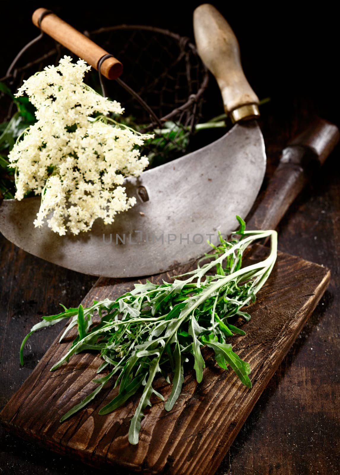 Old Chopping knife with elder and rucola