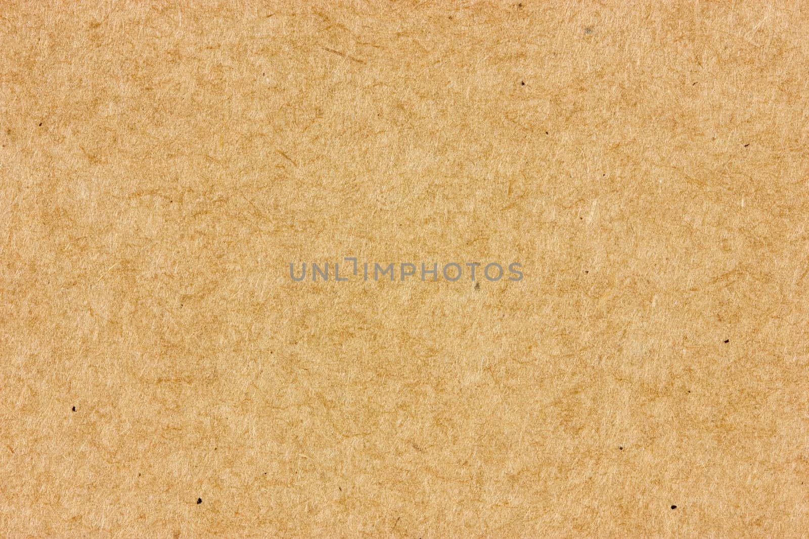Close-up of brown cardboard. May be used as a background