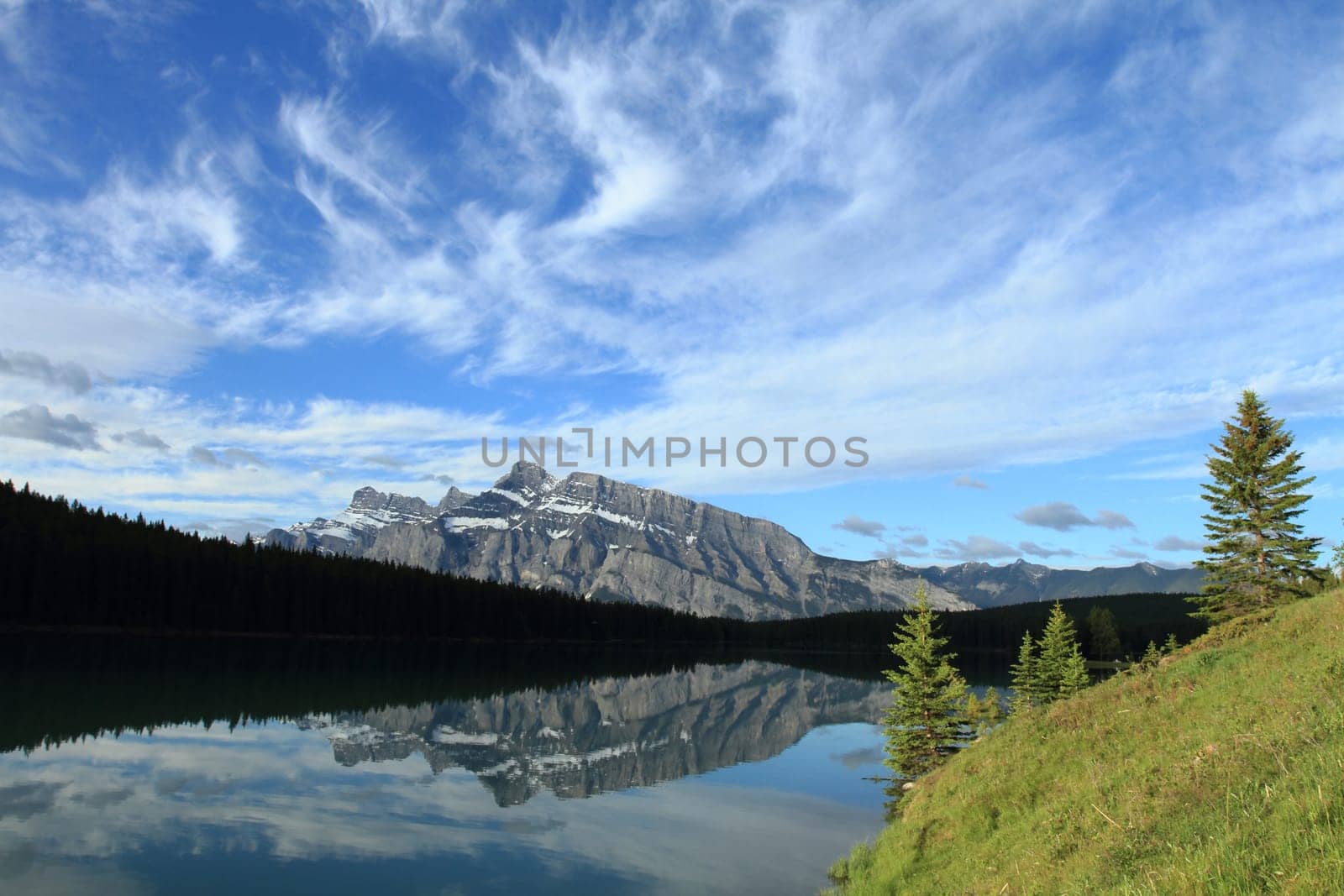 Morning light on Mount Rundle reflected in Two Jack Lake in Banff National Park