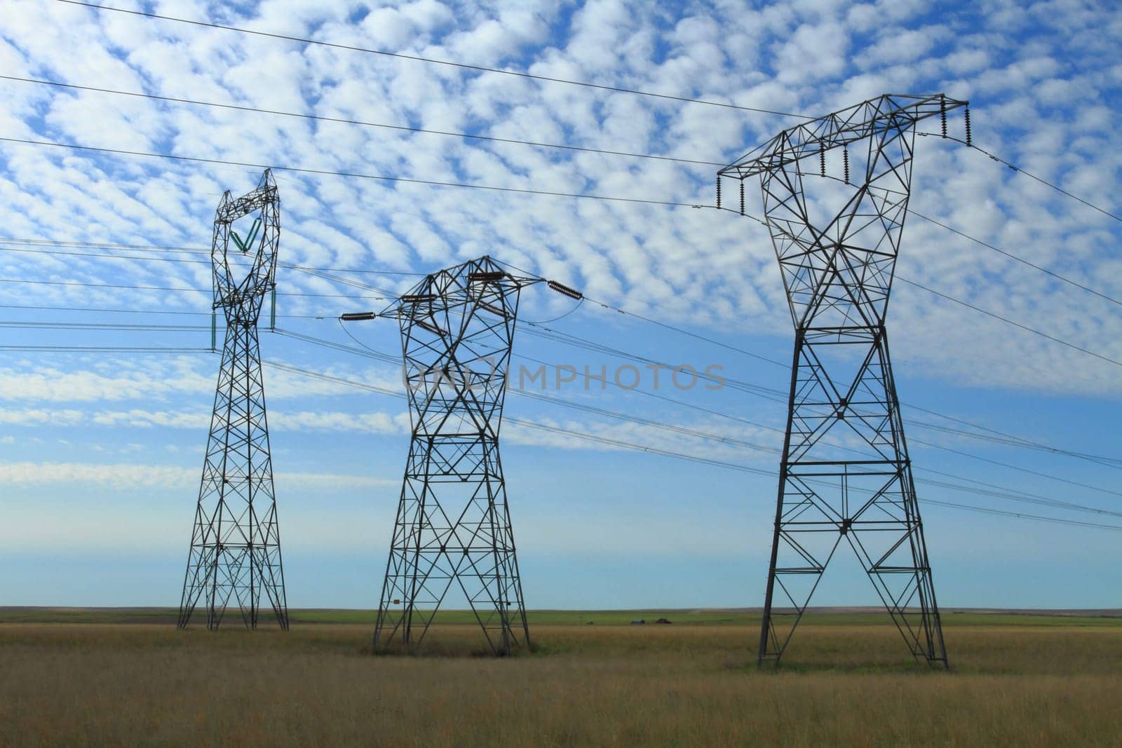 Electrical power pylon with dramatic background clouds