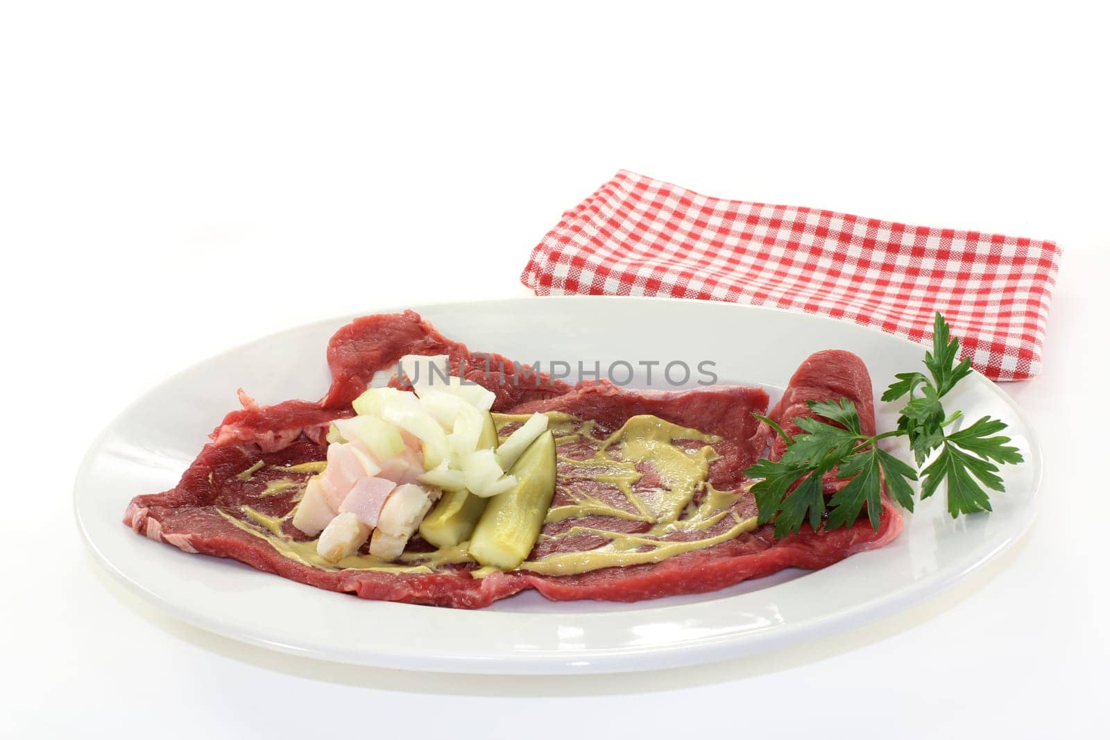 raw beef roulade with bacon,onion and cucumber