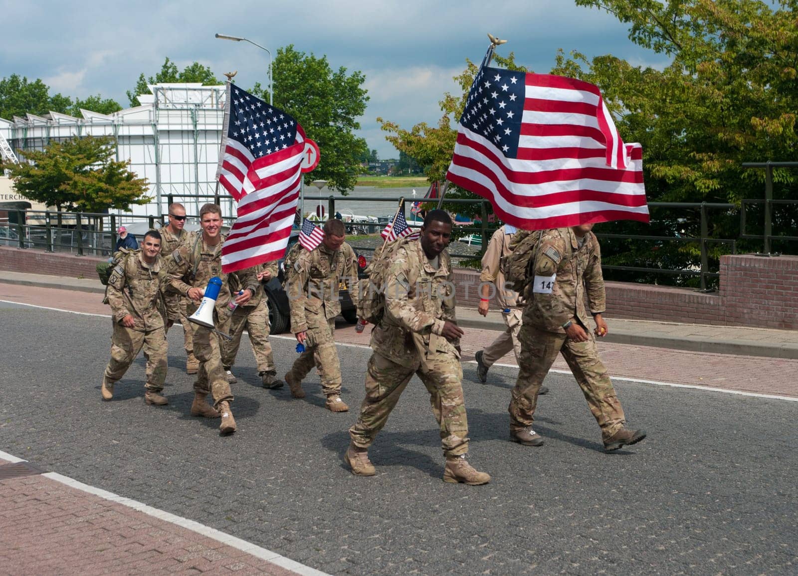 The worlds largest annual walking event with this year over 40,000 participants. The people can choose to walk four days 30, 40 or 50 kilometers  soldiers walk 40km (with 10kg luggage) or 50km without.