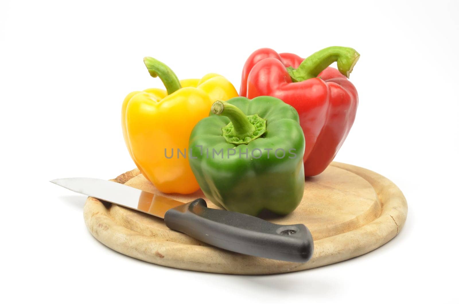 Fresh colorful paprika isolated on white background