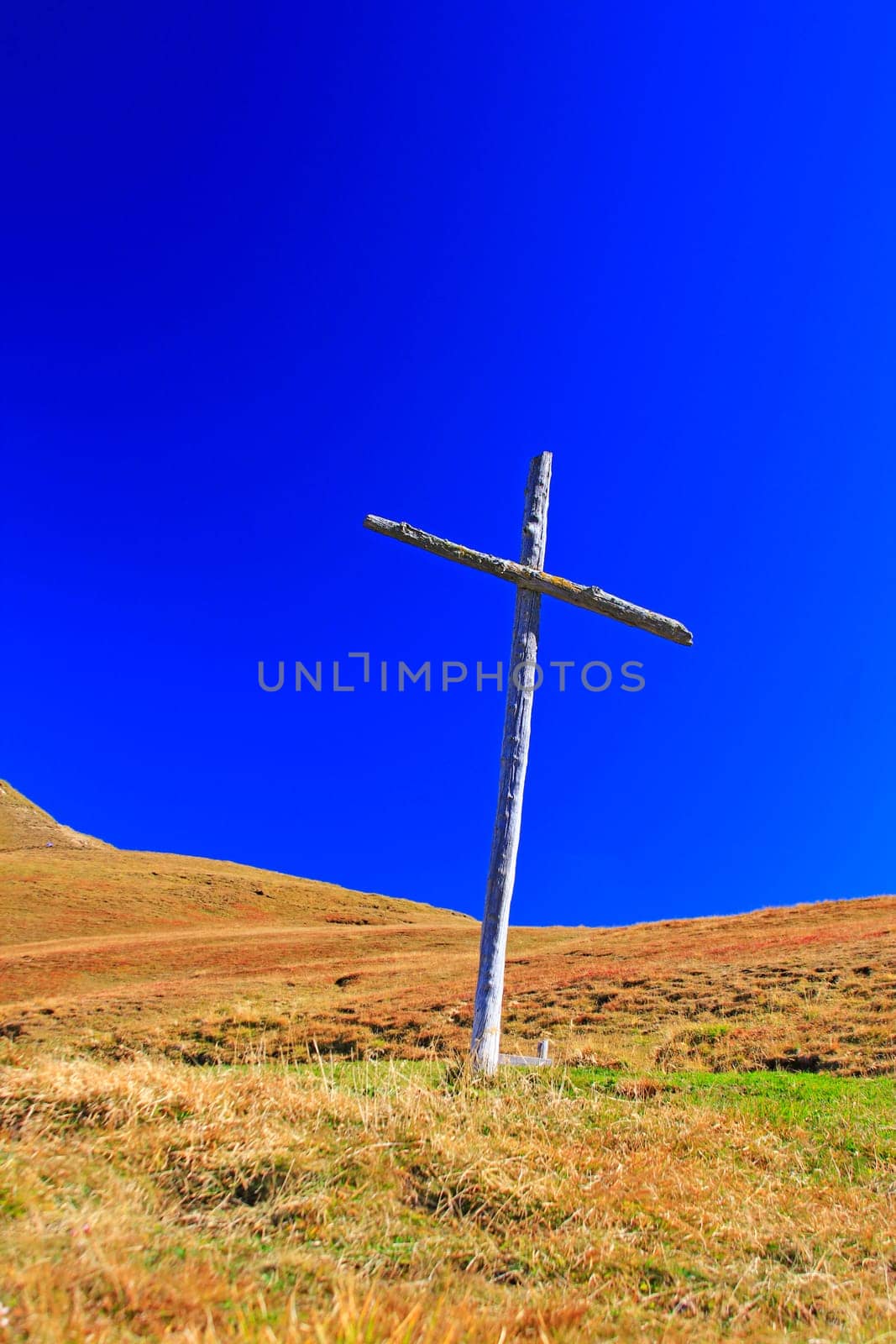 Wooden cross at the Sella Pass (2240m) in the Dolomites,South Tyrol,Italy