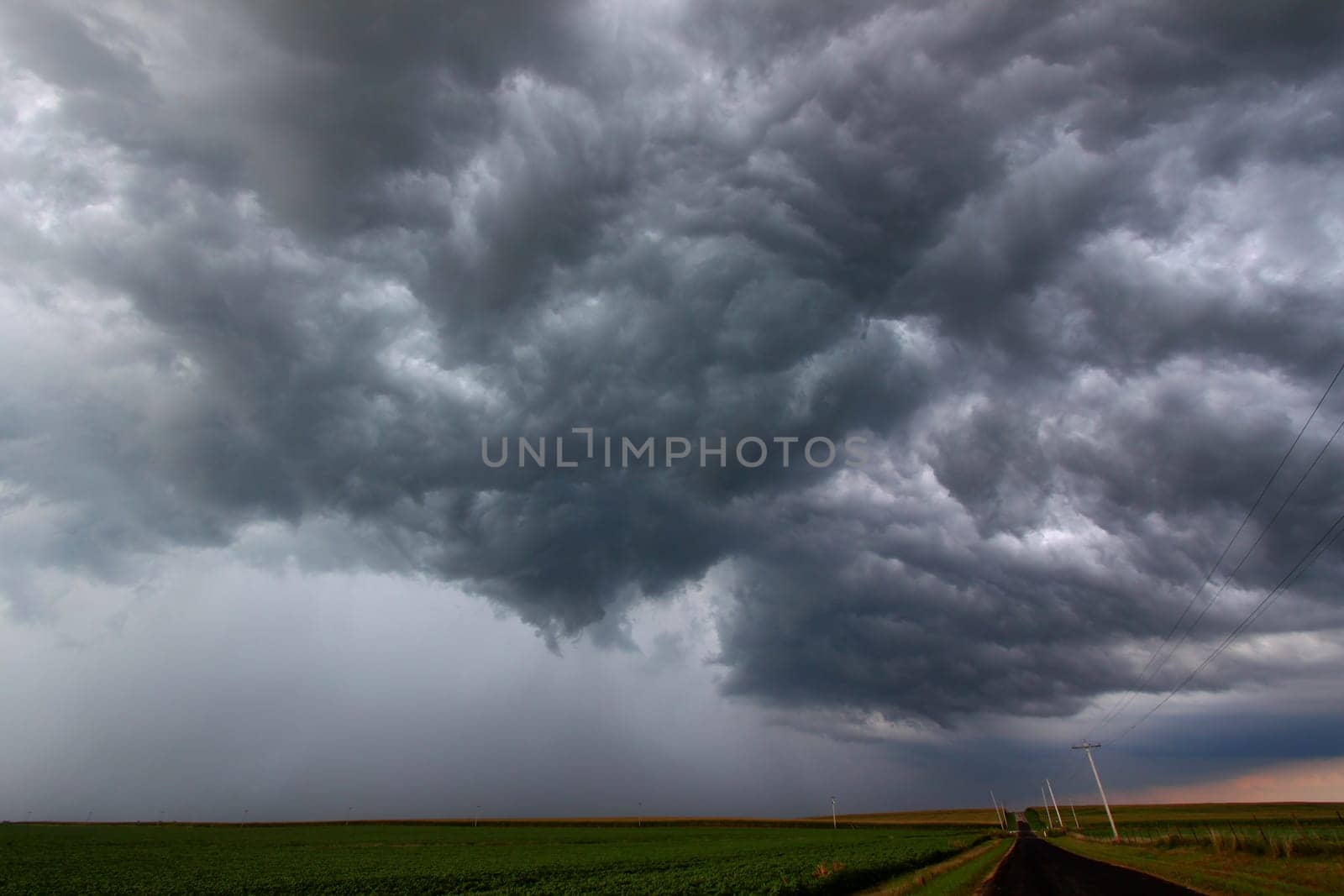 A Severe Thunderstorm forms over the flat farmlands of central Illinois.