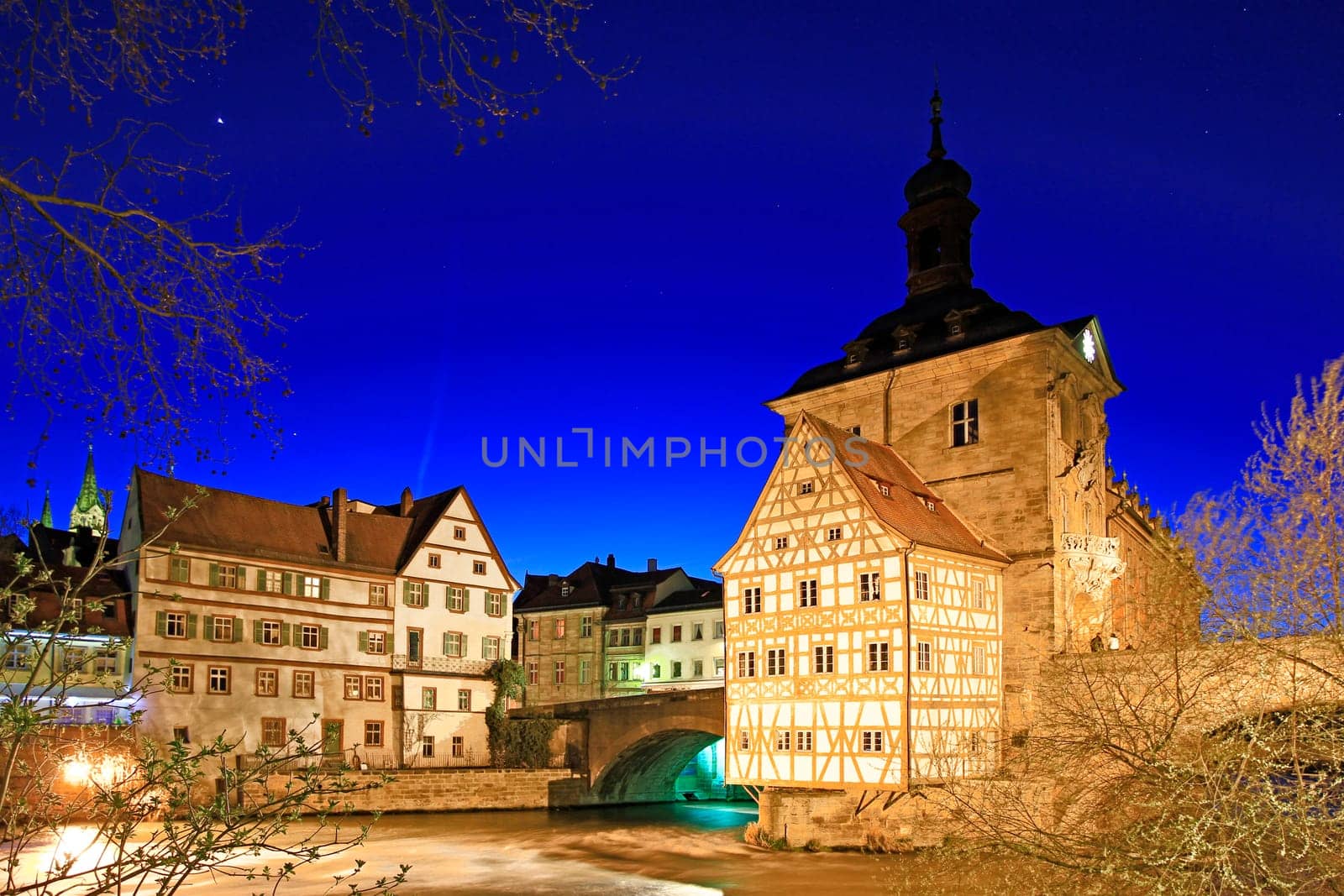 The old town hall of Bamberg on a tiny island in the river Regnitz,Bavaria,Germany - night shot with long exposure