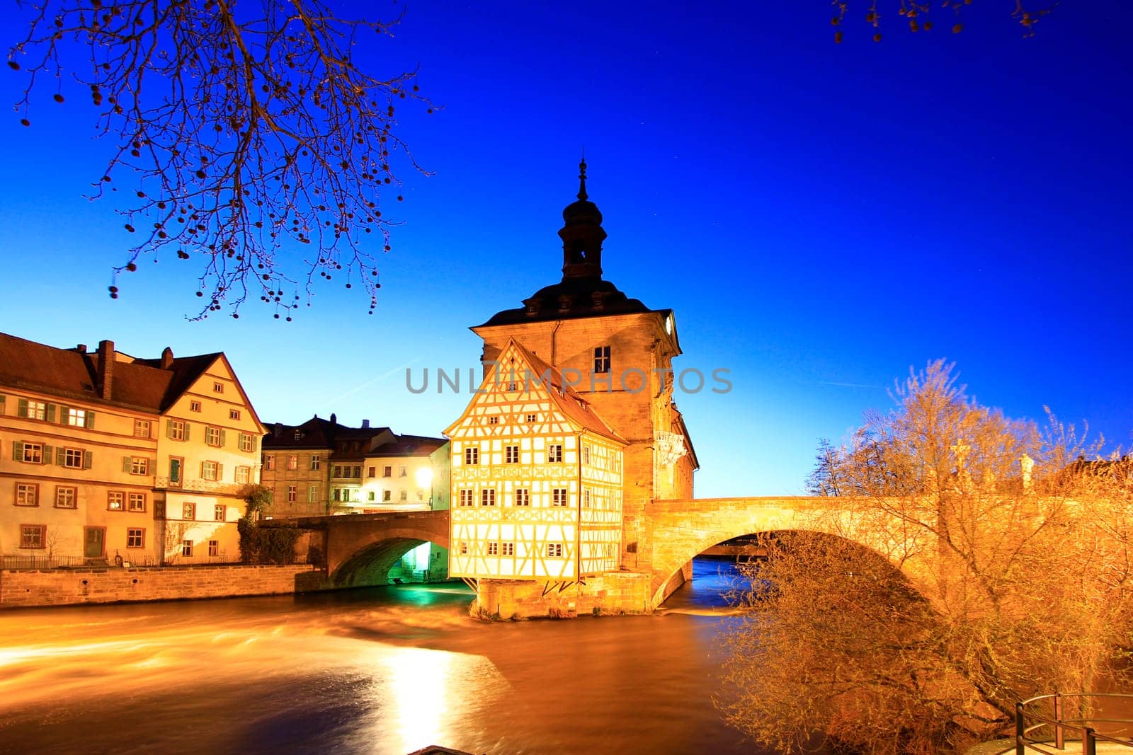 The old town hall of Bamberg on a tiny island in the river Regnitz,Bavaria,Germany - night shot with long exposure