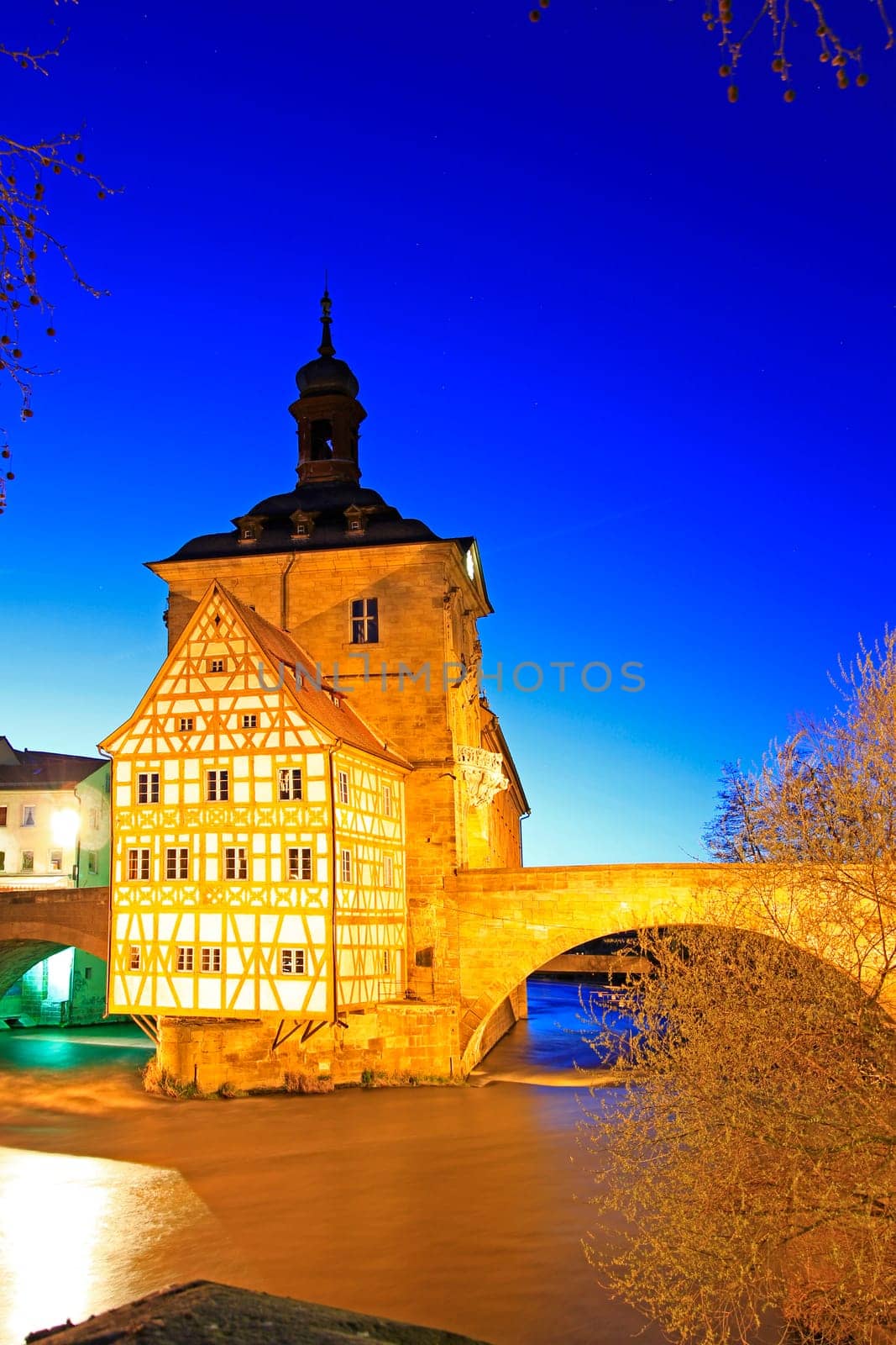 The old town hall of Bamberg on a tiny island in the river Regnitz,Bavaria,Germany - night shot with long exposure