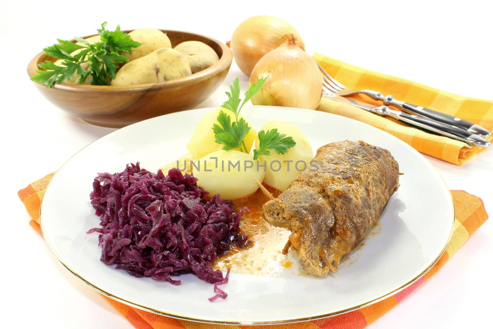 braised beef roulade with potatoes and red cabbage
