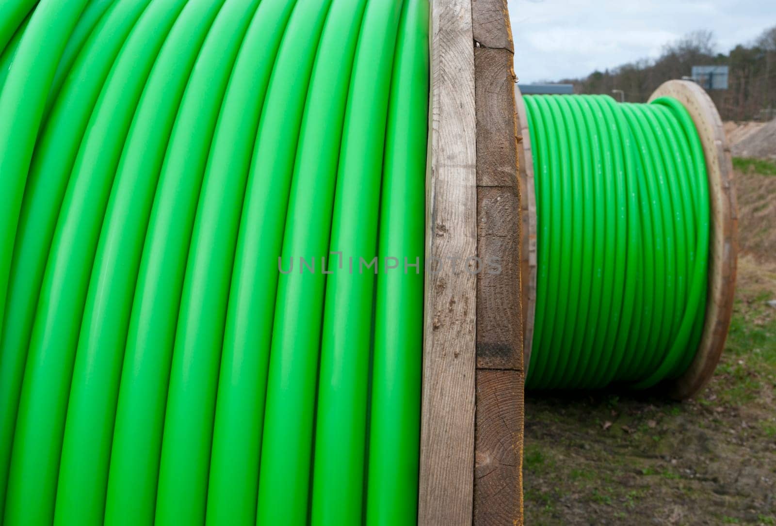 cable drum with green cable on it