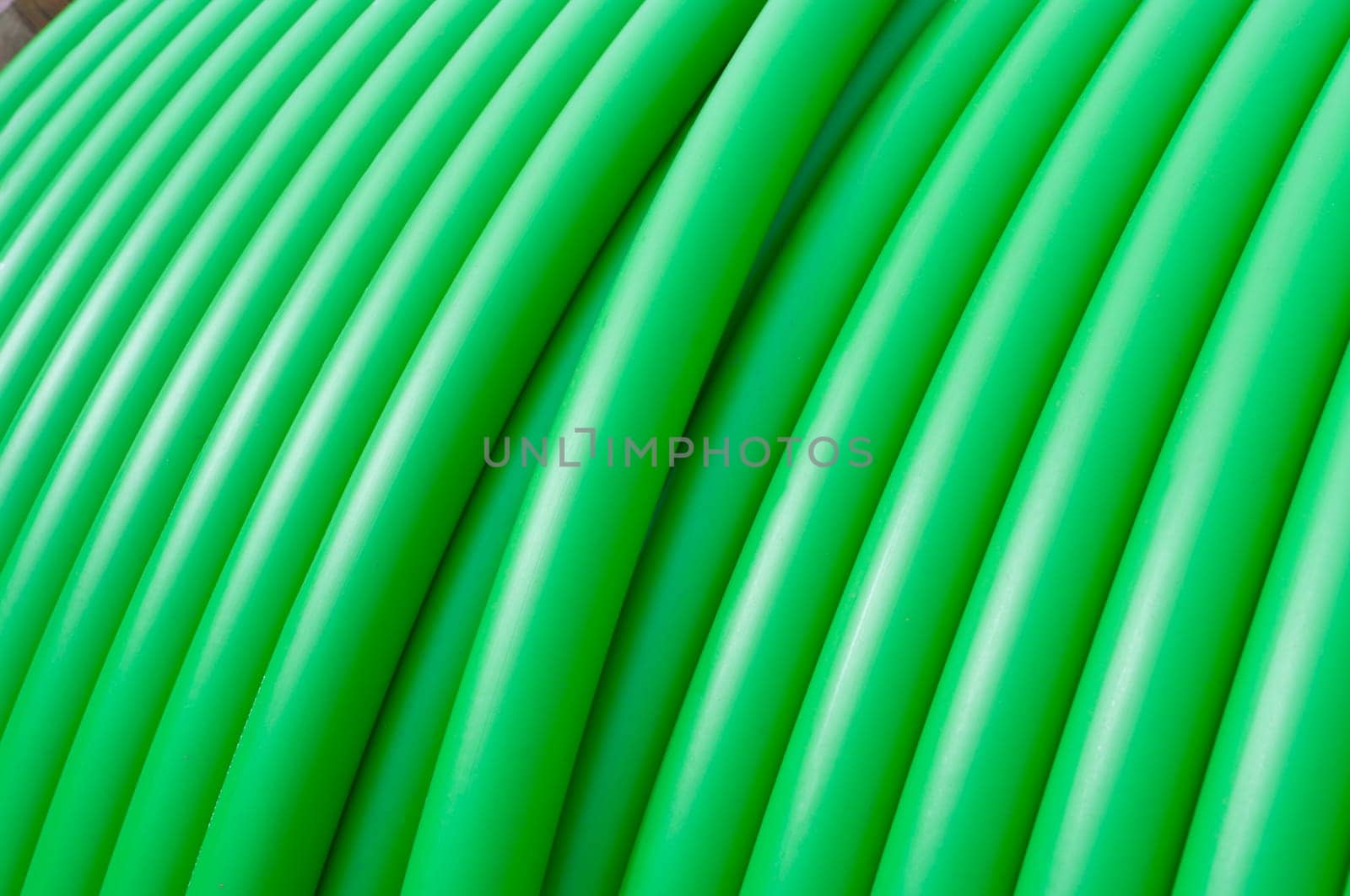 cable drum with green cable on it