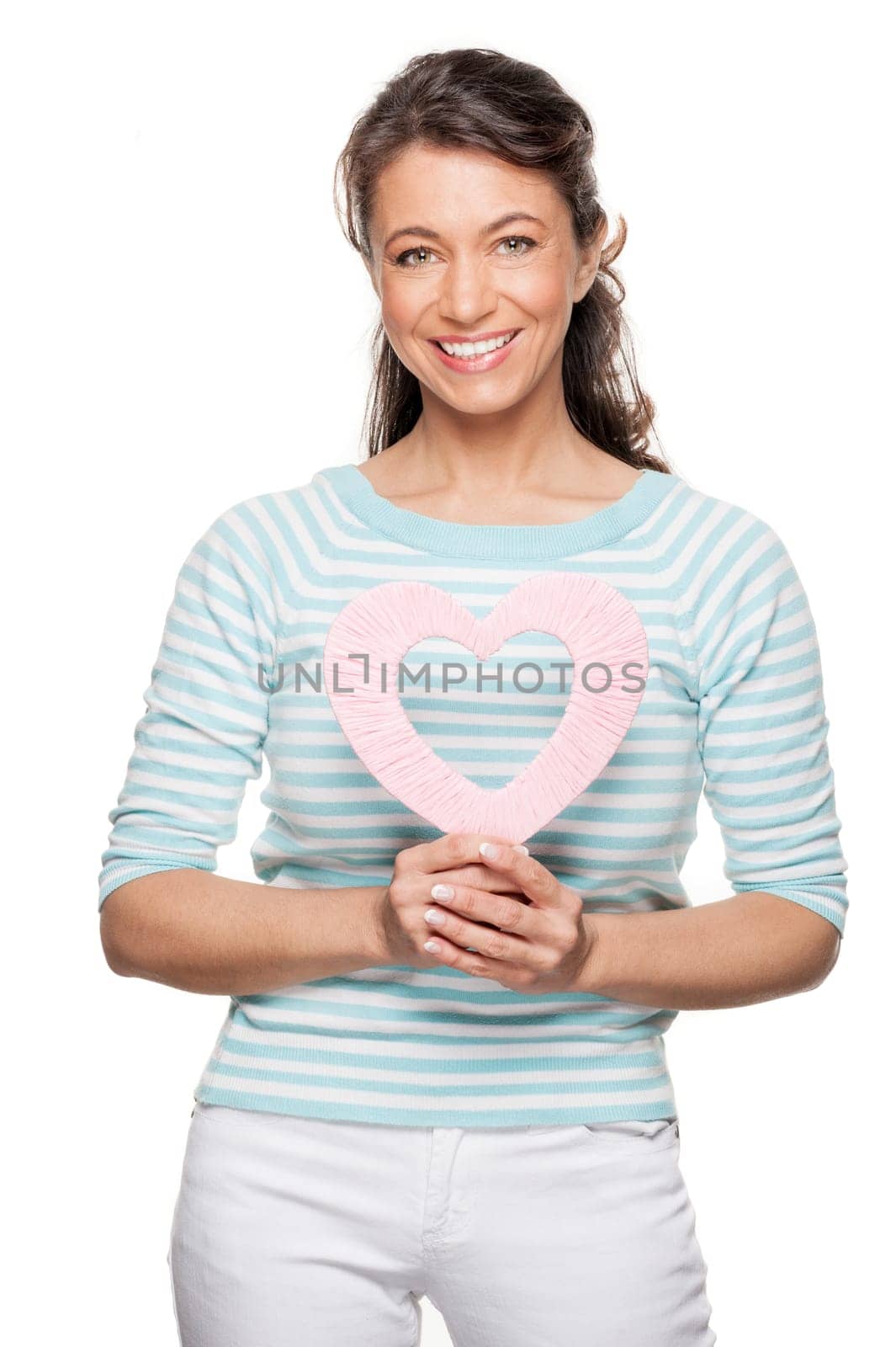 Woman with a pink heart against a white background