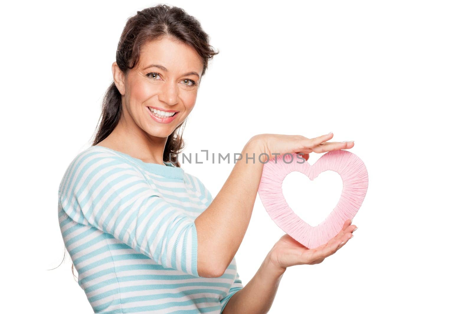 Woman with a pink heart against a white background