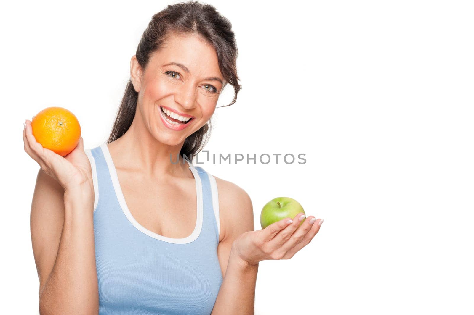Smiling woman in front of white background with an orange