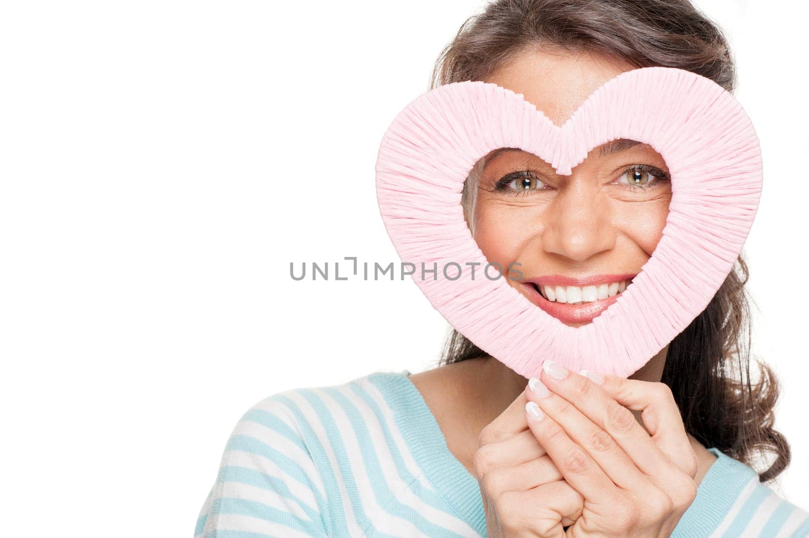 Woman with a pink heart against a white background