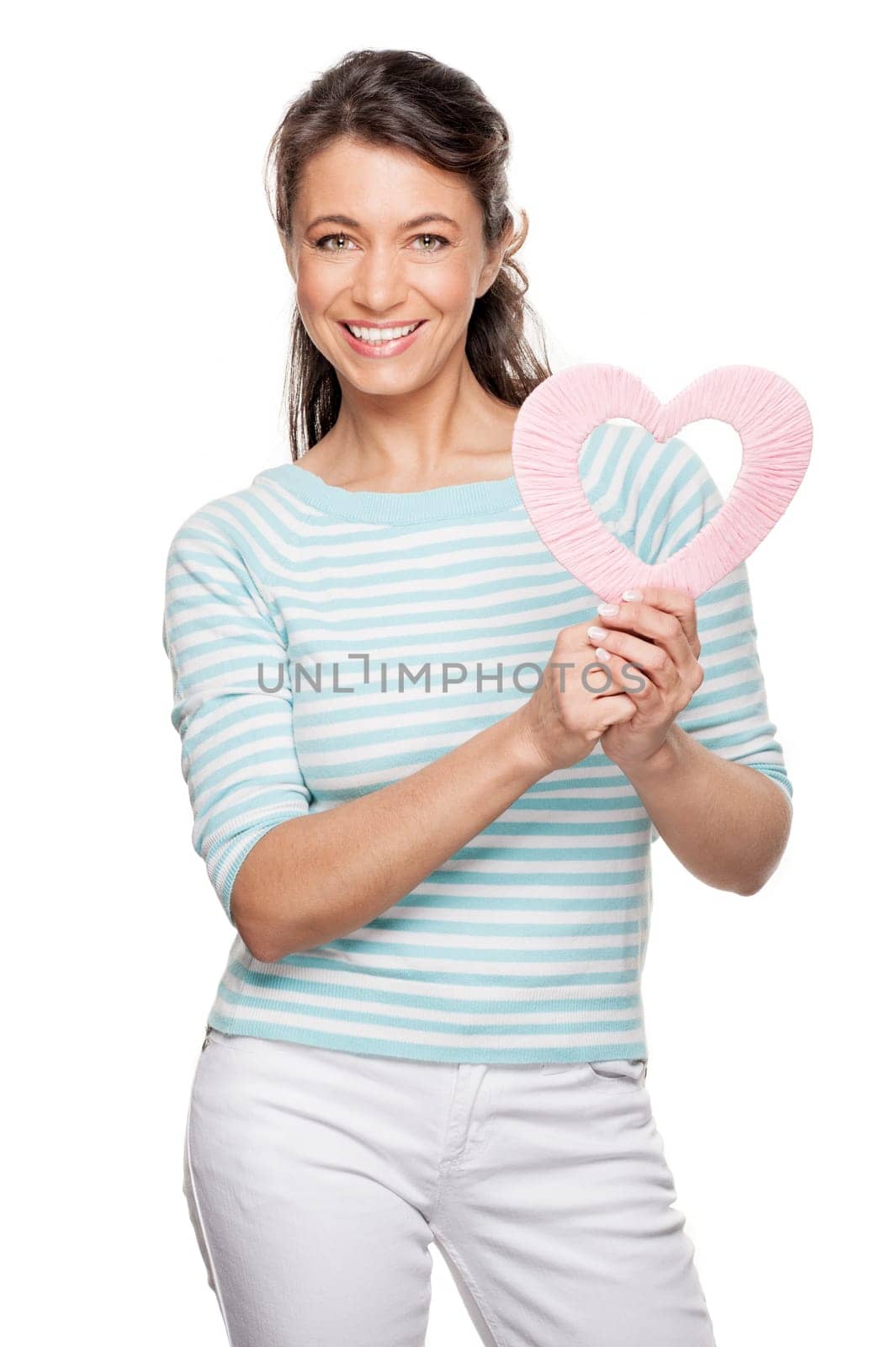 Woman with a pink heart against a white background