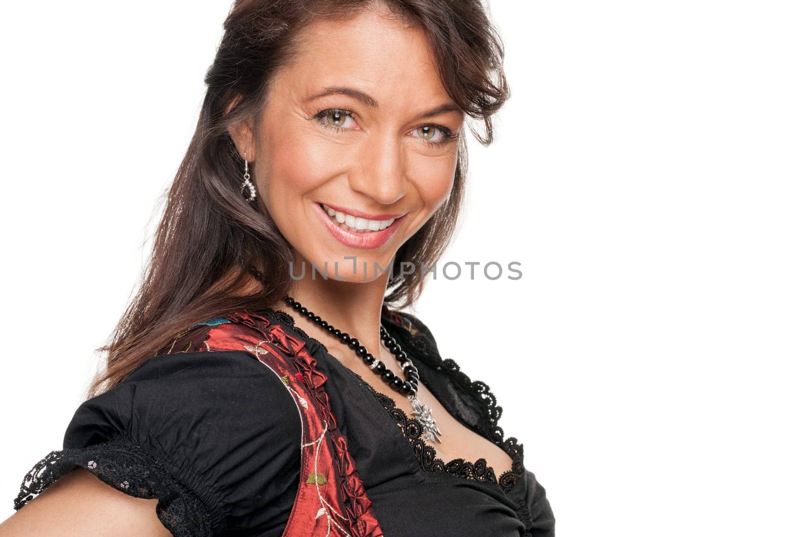 Happy woman with a traditional costume against a white background