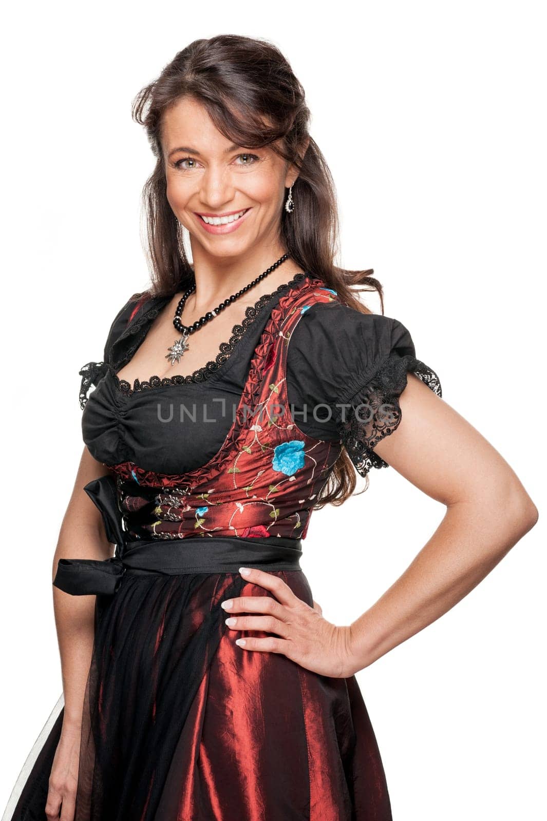 Happy woman with a traditional costume against a white background