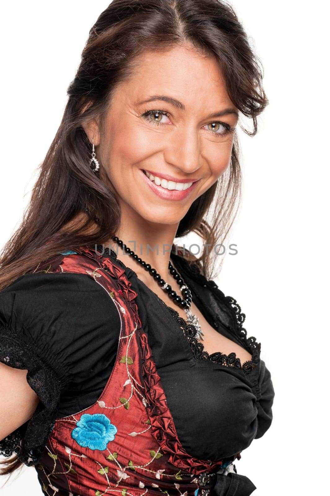 Happy woman with a traditional costume against a white background