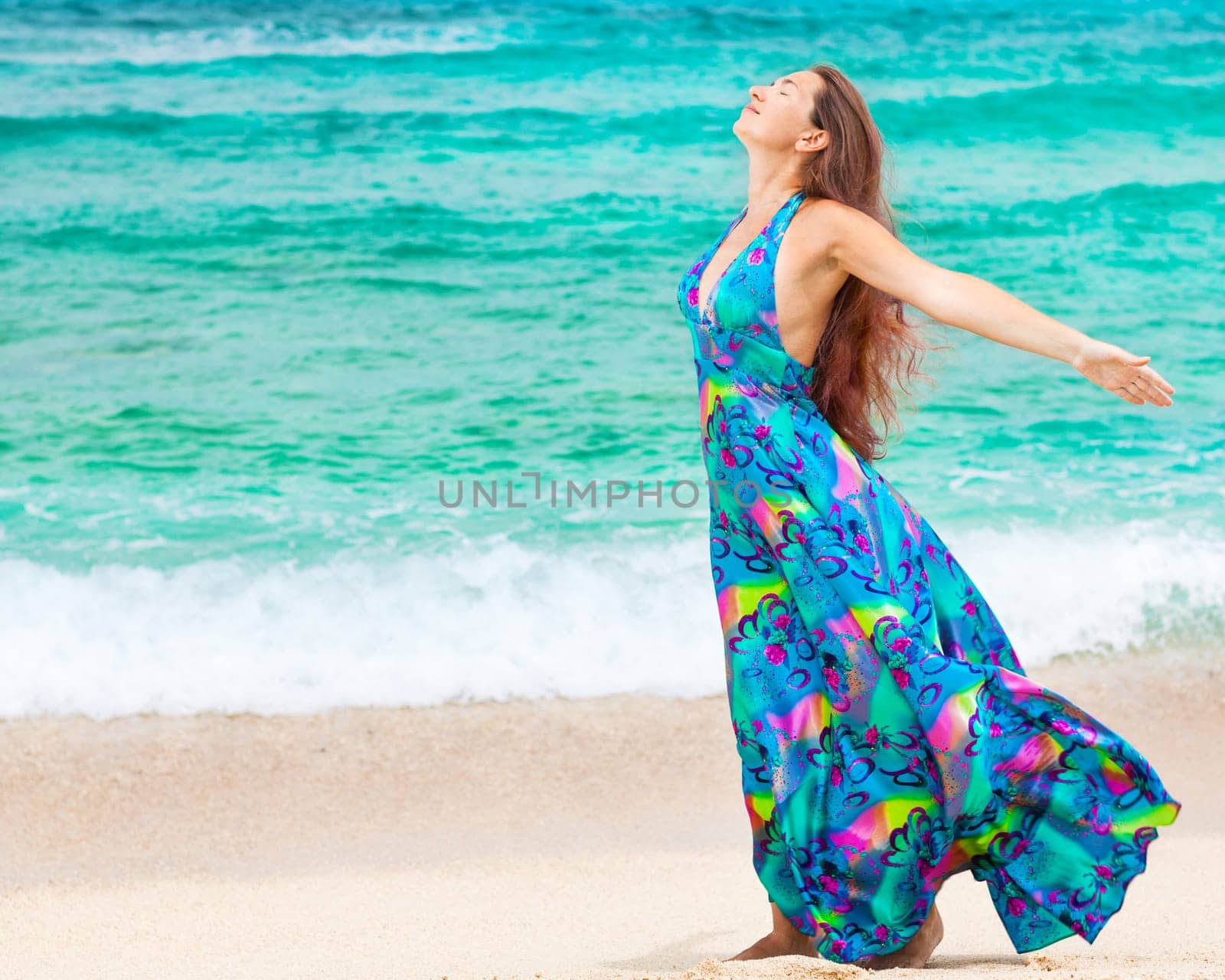 Woman walking near the sea