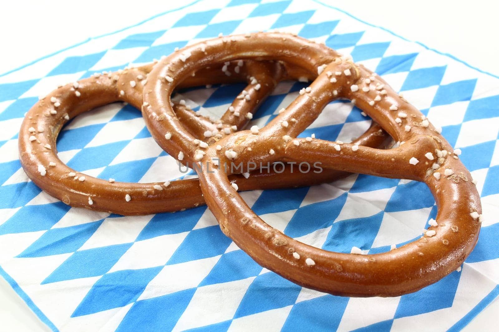 two pretzels on a Bavarian napkin