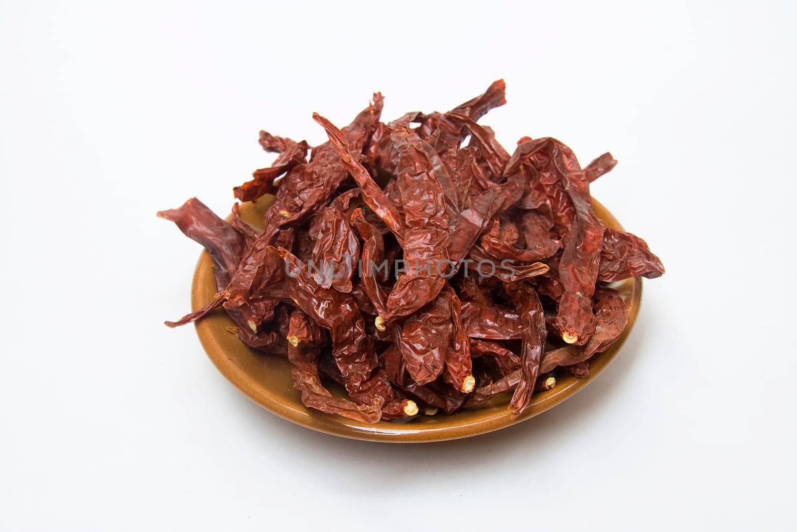 Hot, spicy, pungent, red chillies used to garnish during cooking