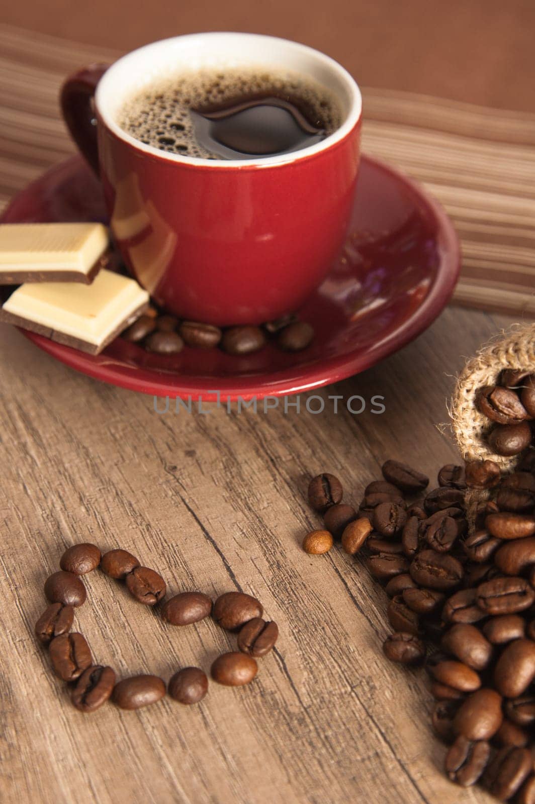 Grains of coffee on a wooden surface