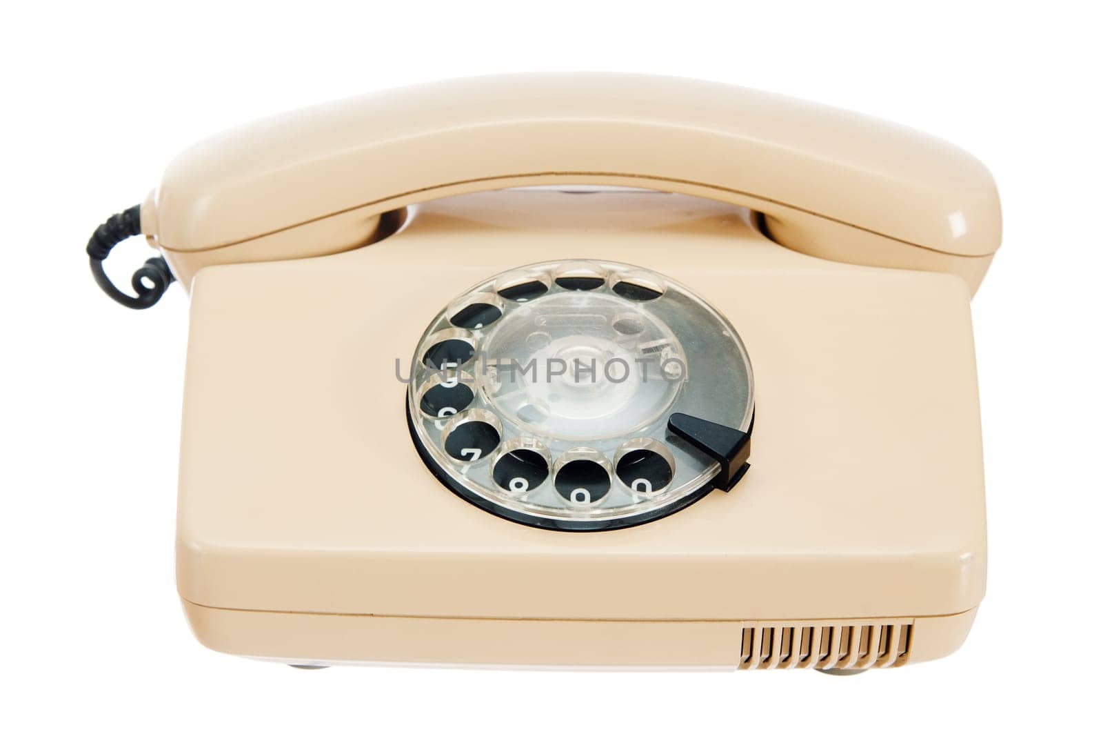 Old analog phone with a disk, it is isolated on white