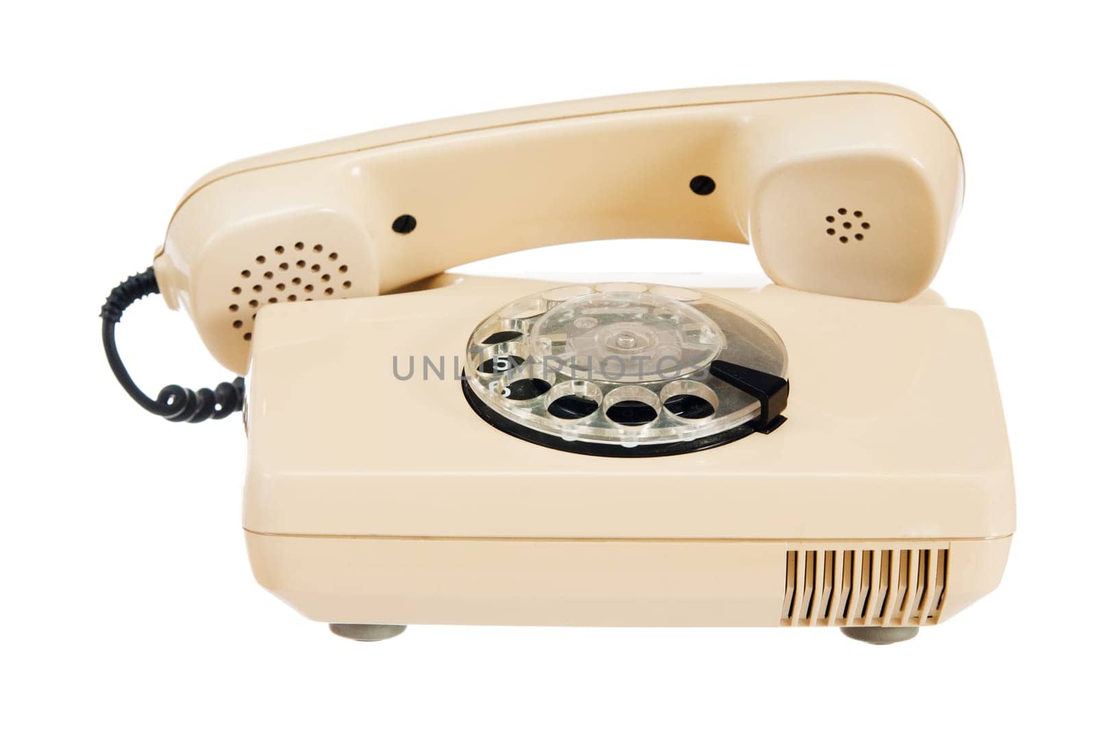 Old analog phone with a disk, it is isolated on white