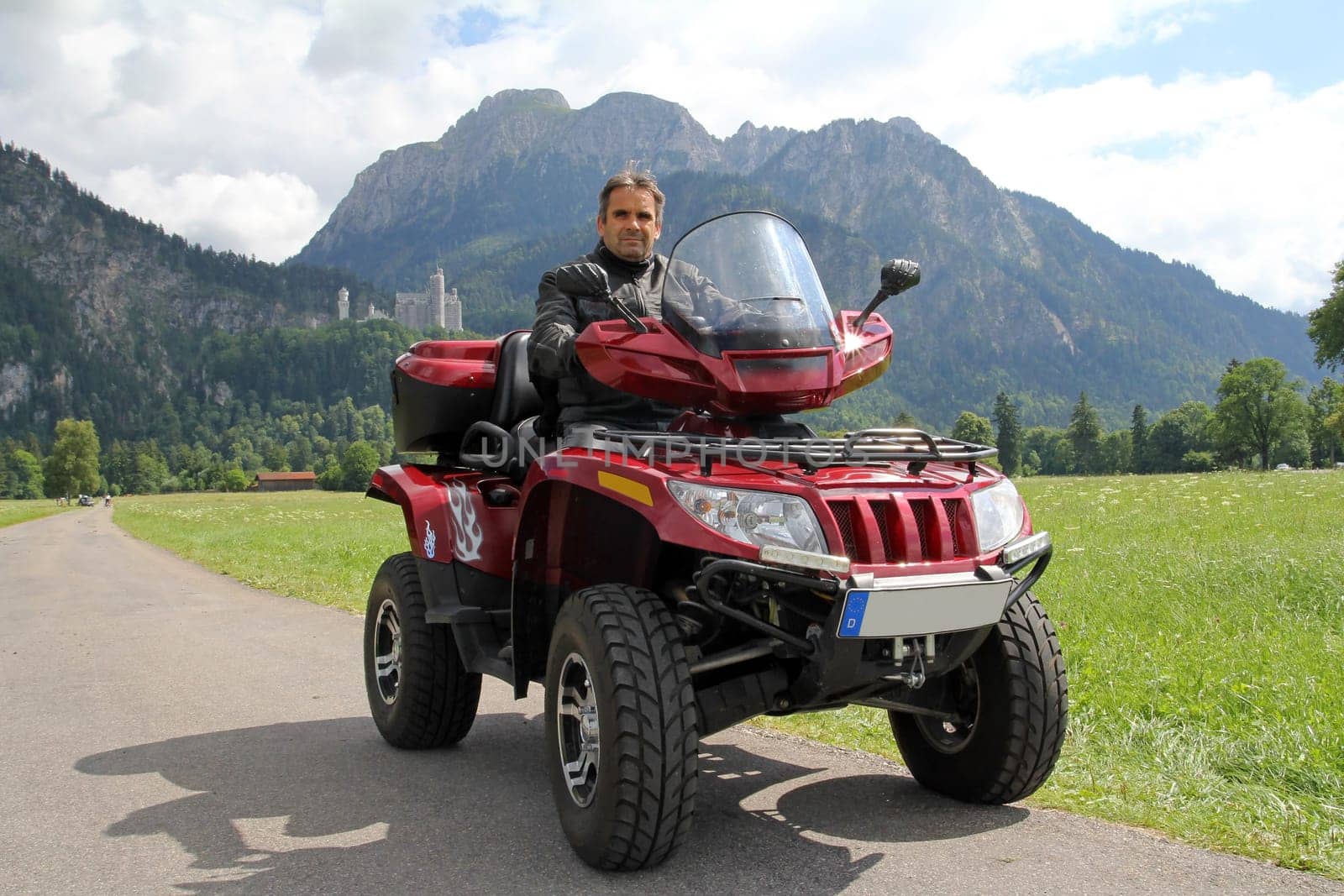 With the quad bike in front of Neuschwanstein Castle