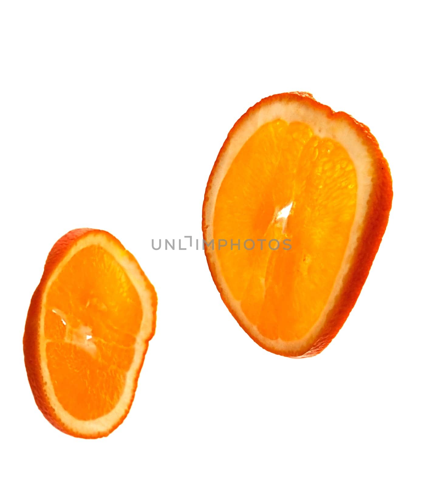 Isolated slices of orange on a white background