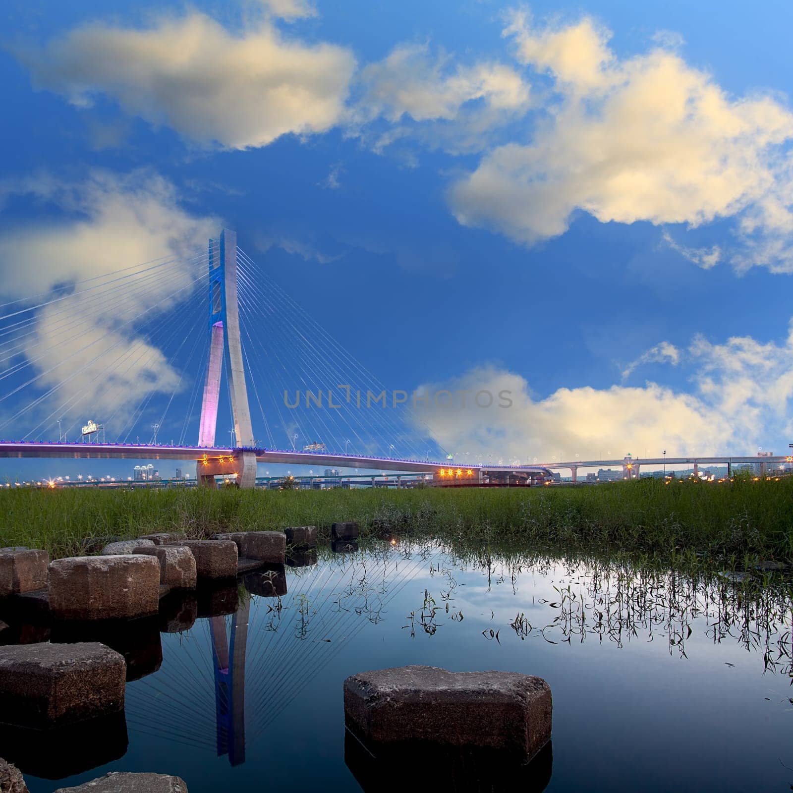 A modern neon light bridge at night, New Taipei, Taiwan