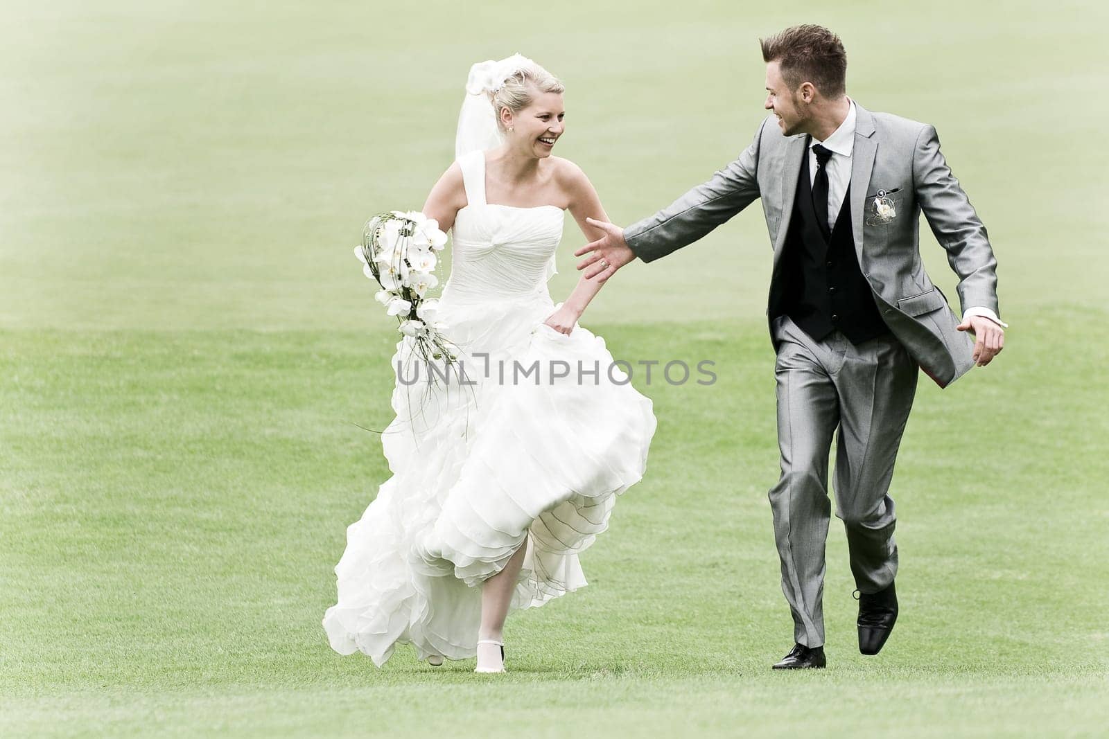 Pretty bride and groom celebrate their wedding