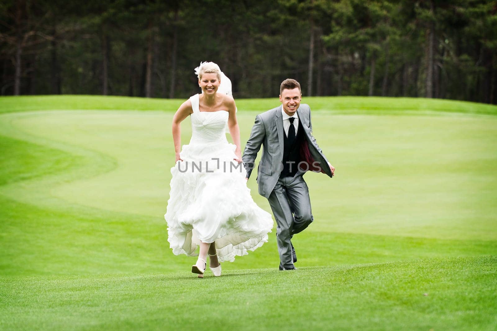 Pretty bride and groom celebrate their wedding