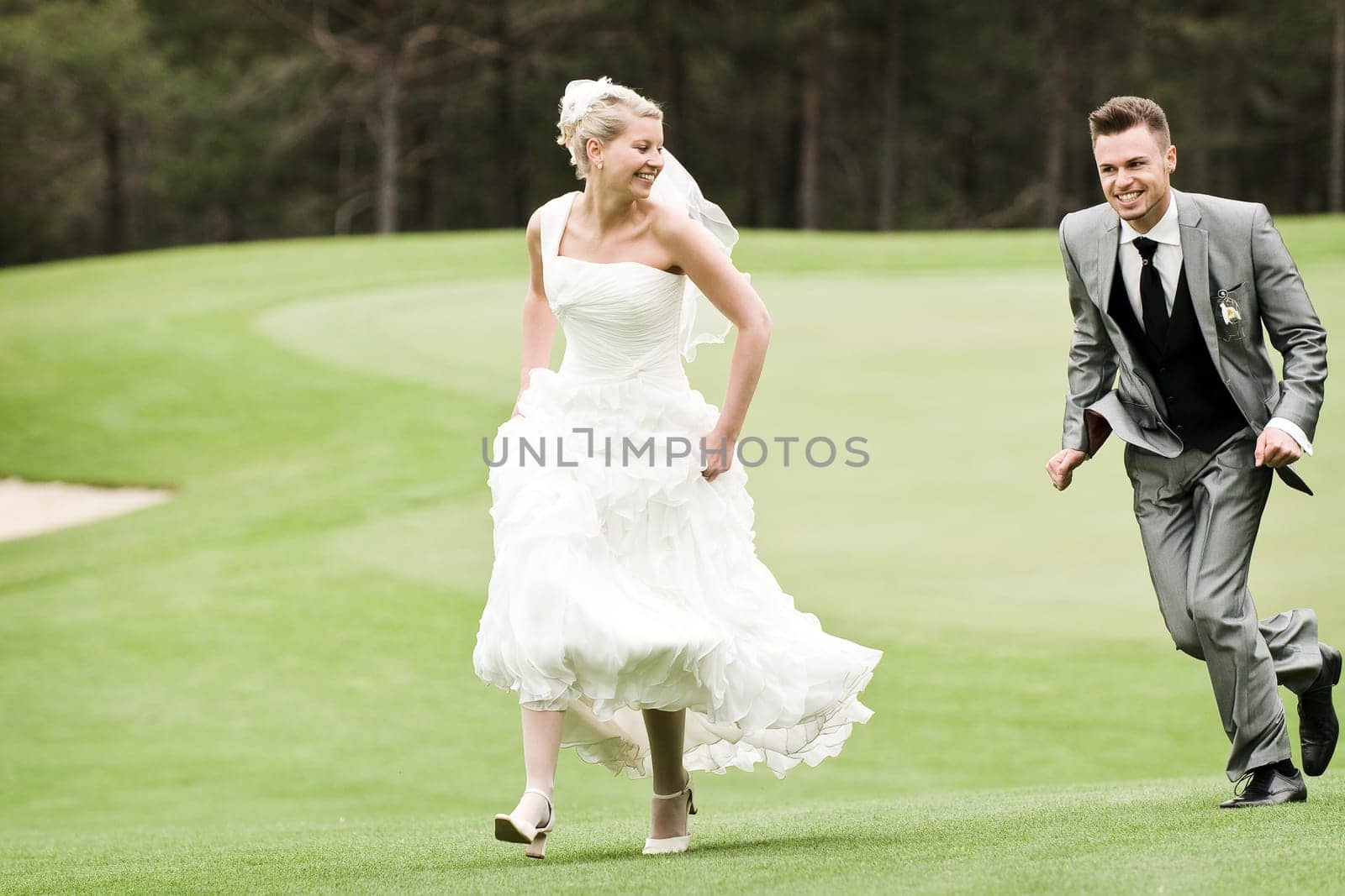 Pretty bride and groom celebrate their wedding