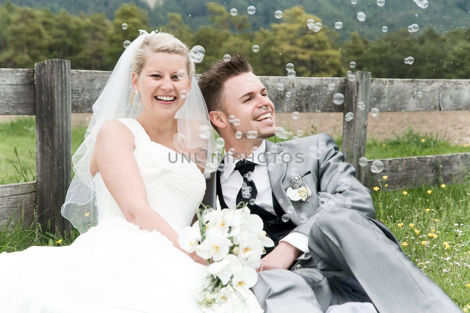 Pretty bride and groom celebrate their wedding