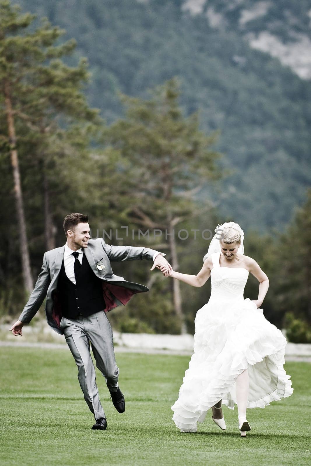 Pretty bride and groom celebrate their wedding