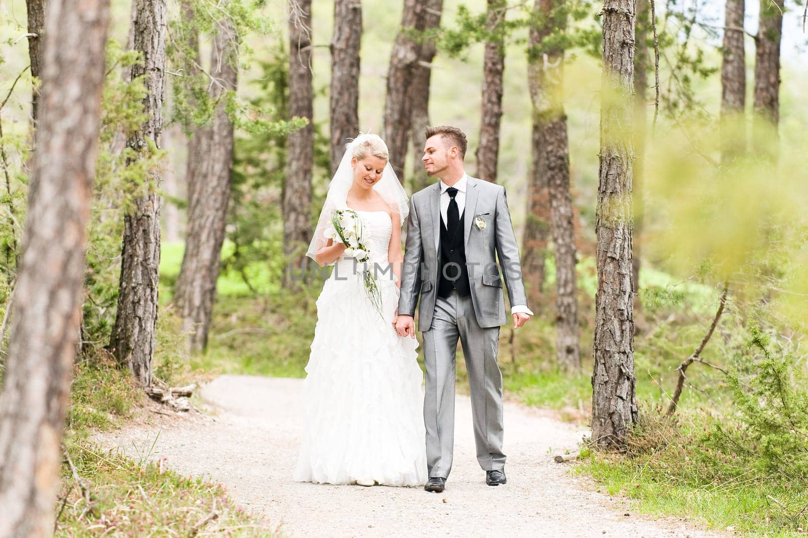 Pretty bride and groom celebrate their wedding