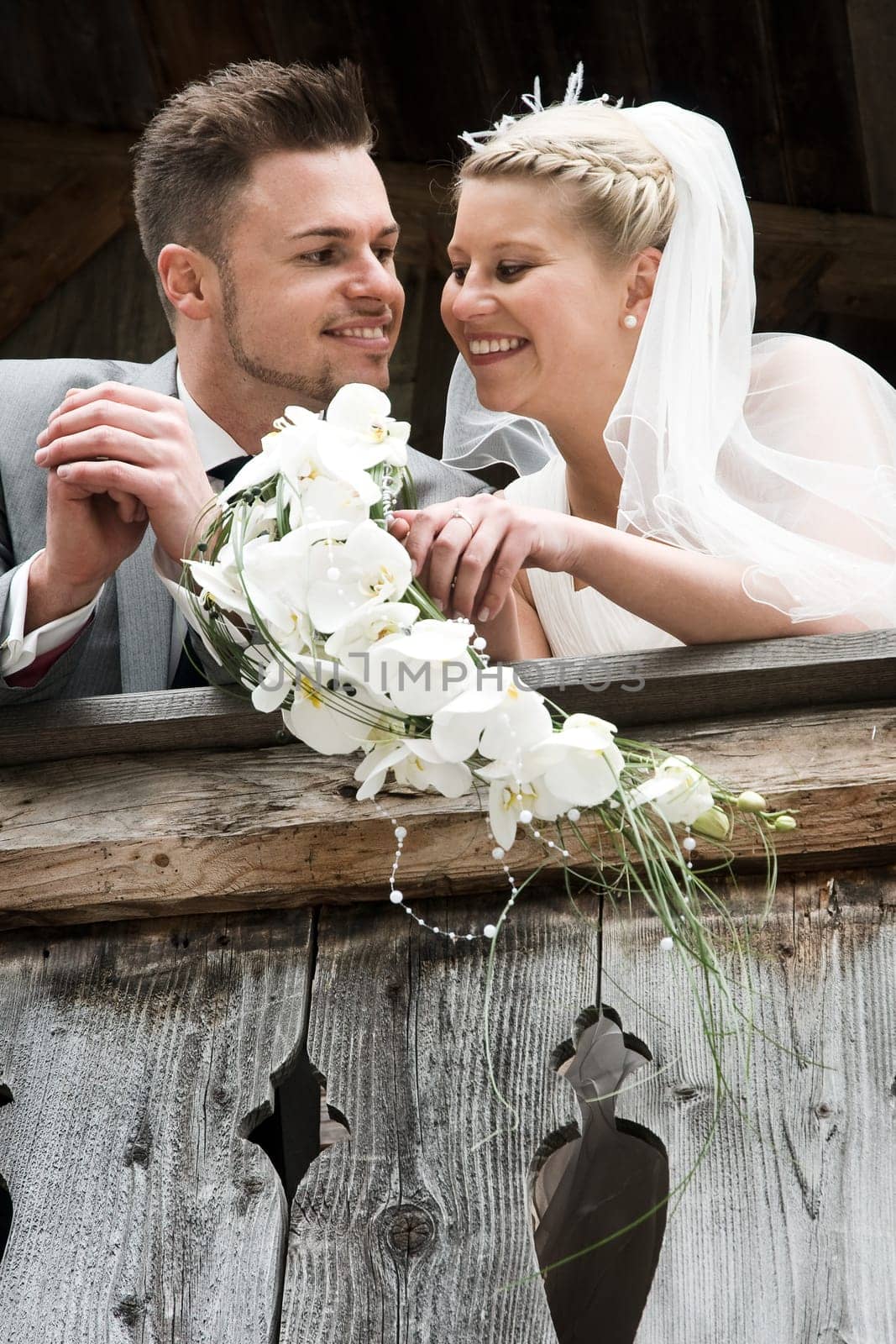 Pretty bride and groom celebrate their wedding