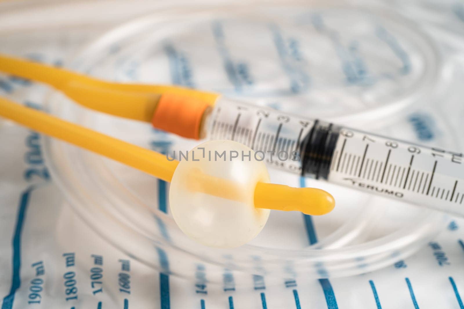 Foley urinary catheter with urine bag for disability or patient in hospital.