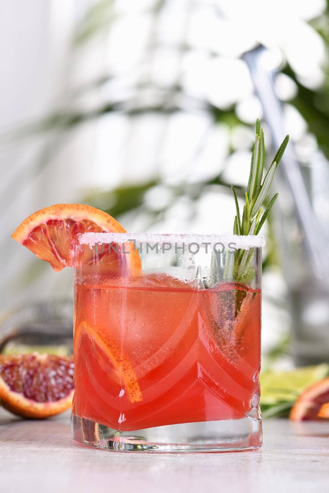 Red Sicilian Orange Paloma Cocktail of tequila, fresh lime and rosemary with red Sicilian orange juice. This cocktail is full of bright citrus aromas and herbs. Indulge your palate with an excellent drink.