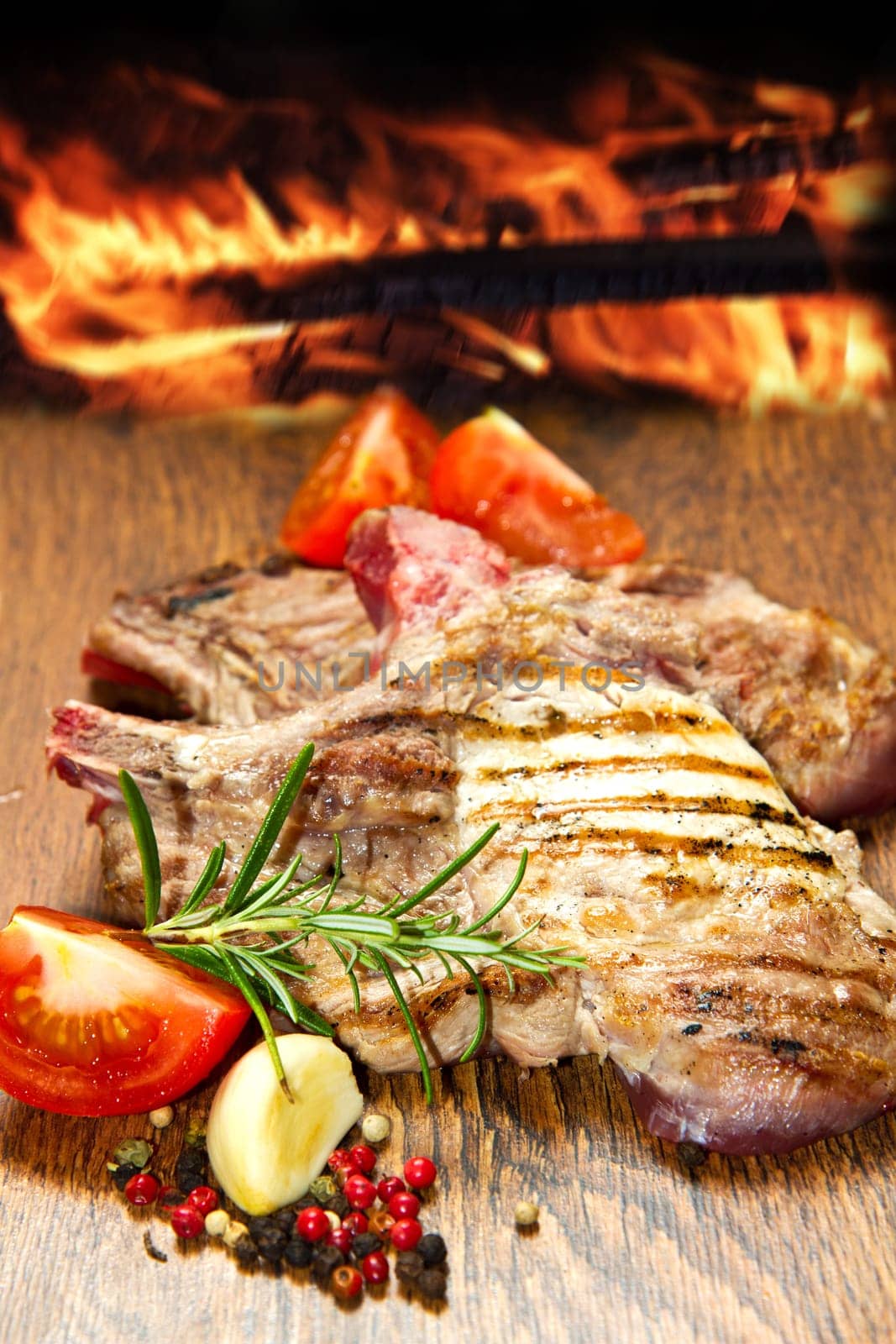 Grilled meat on wooden table