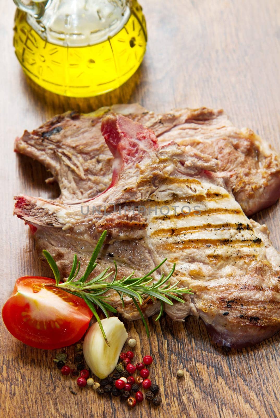 Grilled meat on wooden table