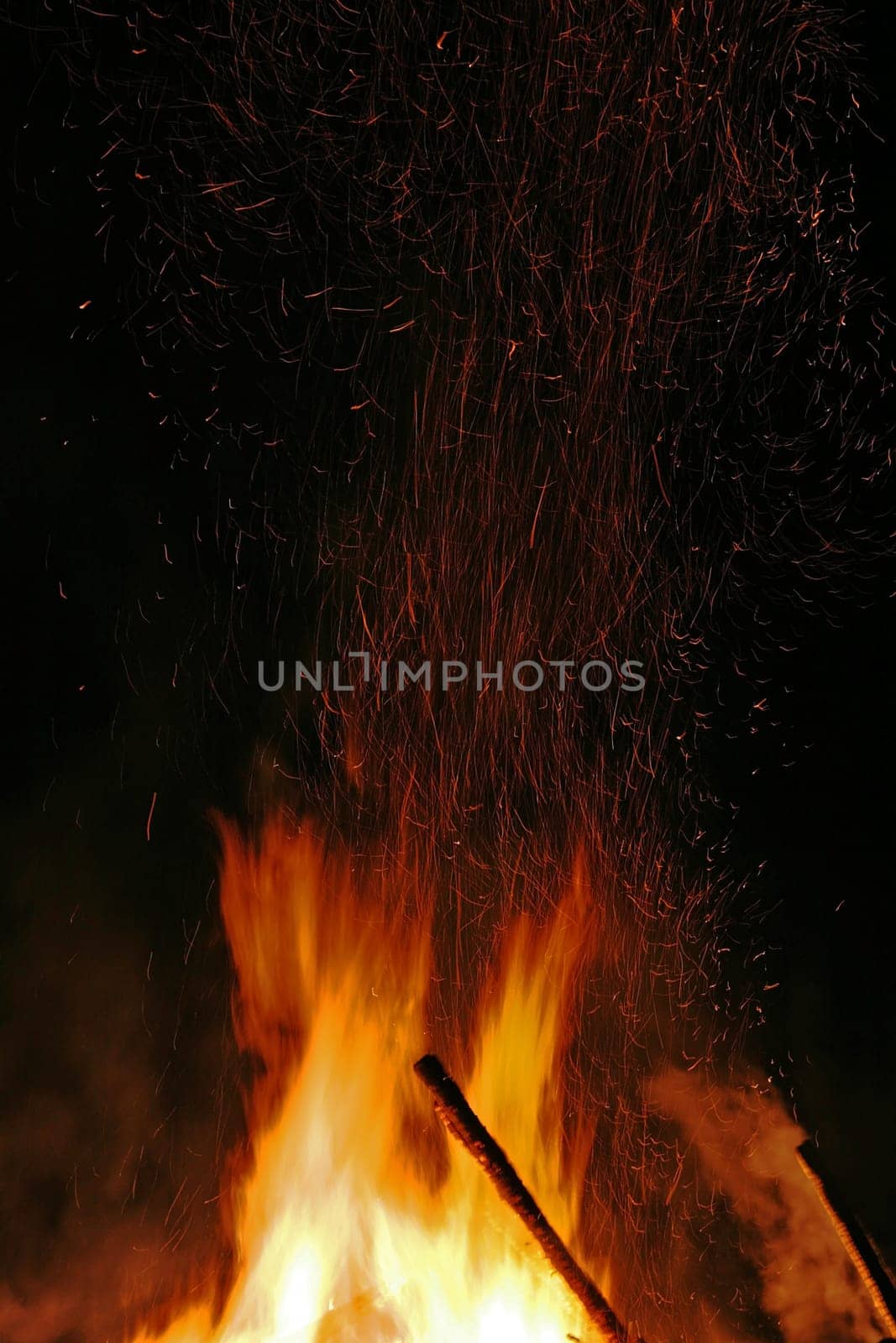 Flying sparks in a big fire
