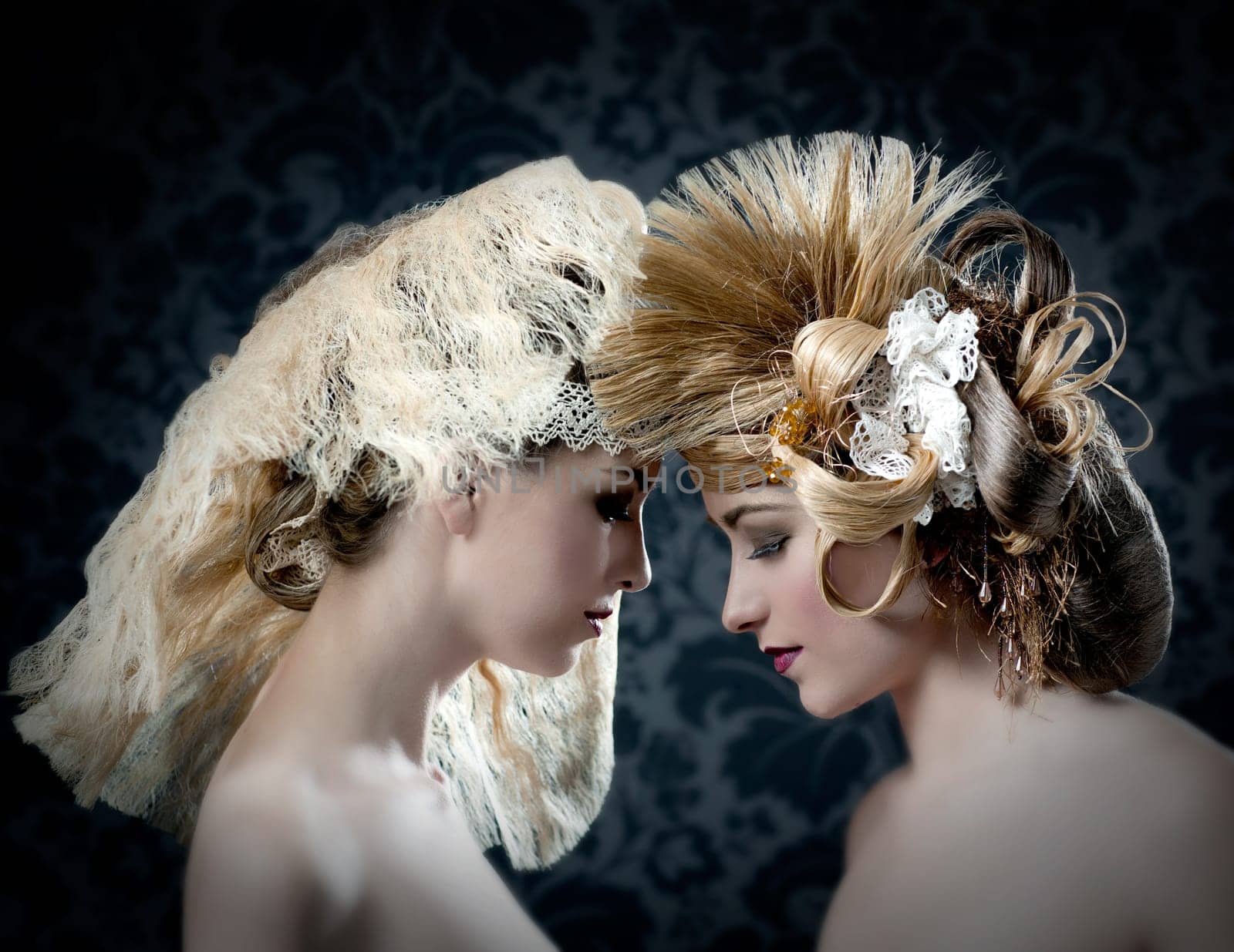 Hairdressing and makeup fashion two woman on dark background