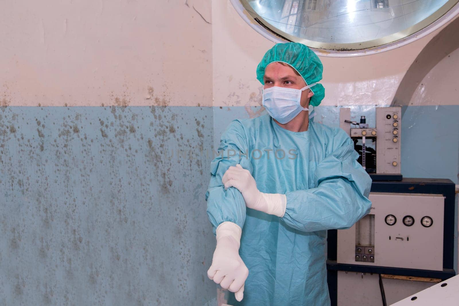 Surgeon prepare its clothes before coming difficult surgery